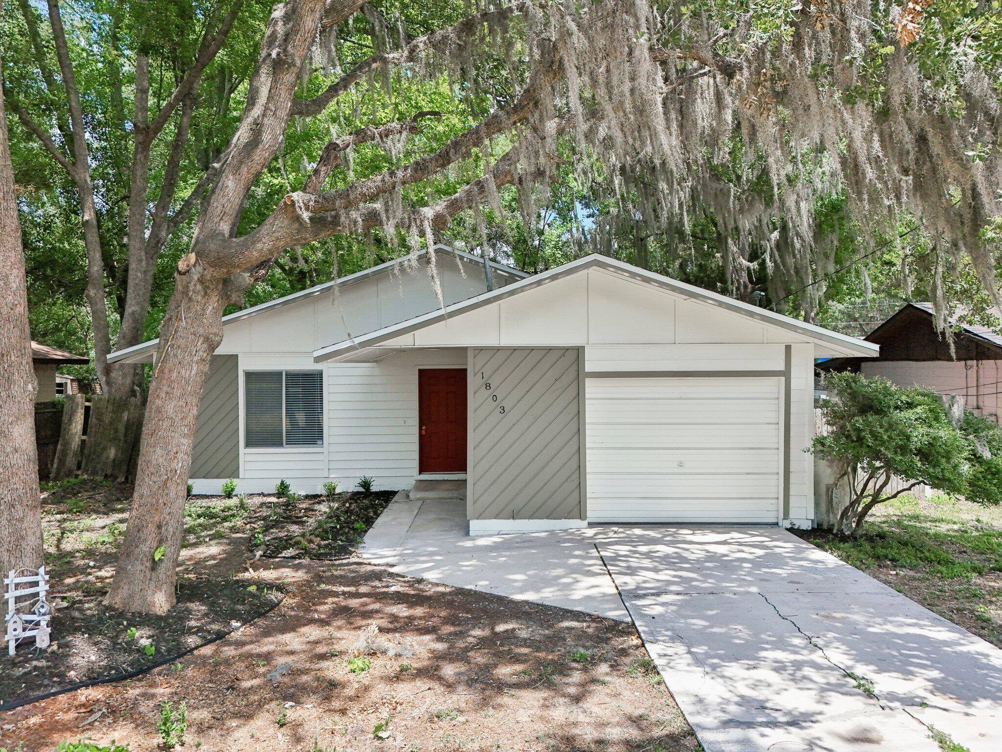 This is a brand new home ready for a new chapter after renovations, featuring a brand new roof, flooring, exterior interior paint, bathroom and kitchen remodels.