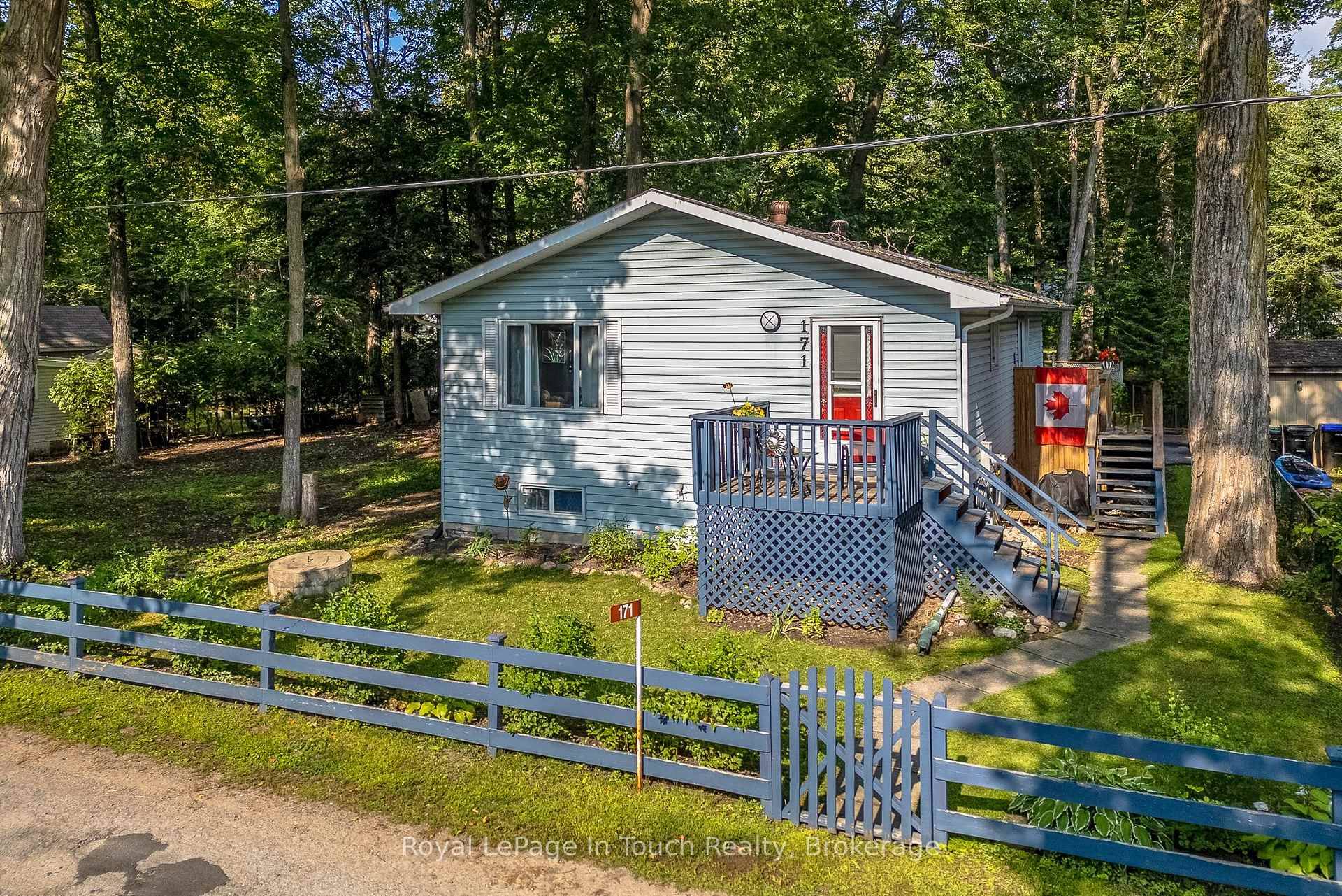 Welcome to this inviting 4 bedroom, 2 bath home, ideally located just a short walk to the sandy shores of Cawaja Beach in the beloved Tiny Beaches area.