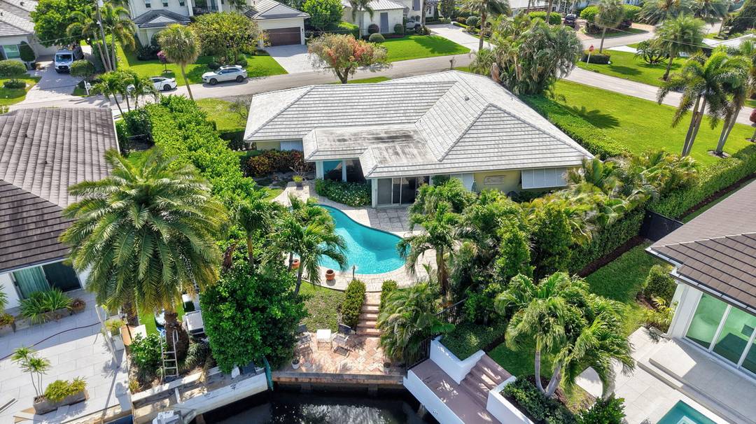 Amazing opportunity to lease a corner lot waterfront home in Inlet Cay the charming and upscale beach town of Ocean Ridge.
