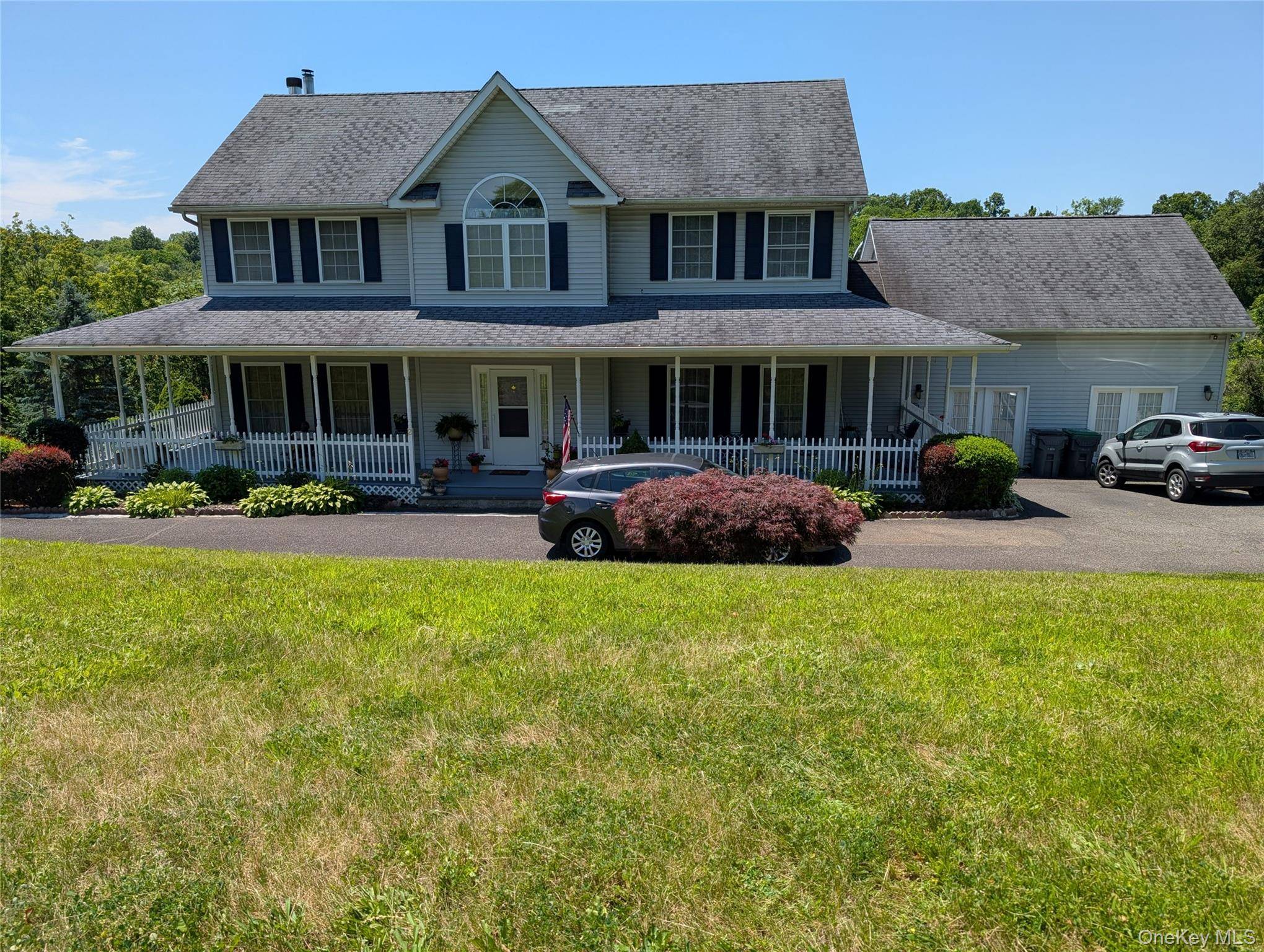 MOTIVATED SELLER. Welcome to 2 Melissa Lane, located in a well sought after quiet family friendly neighborhood in a serene and scenic setting.
