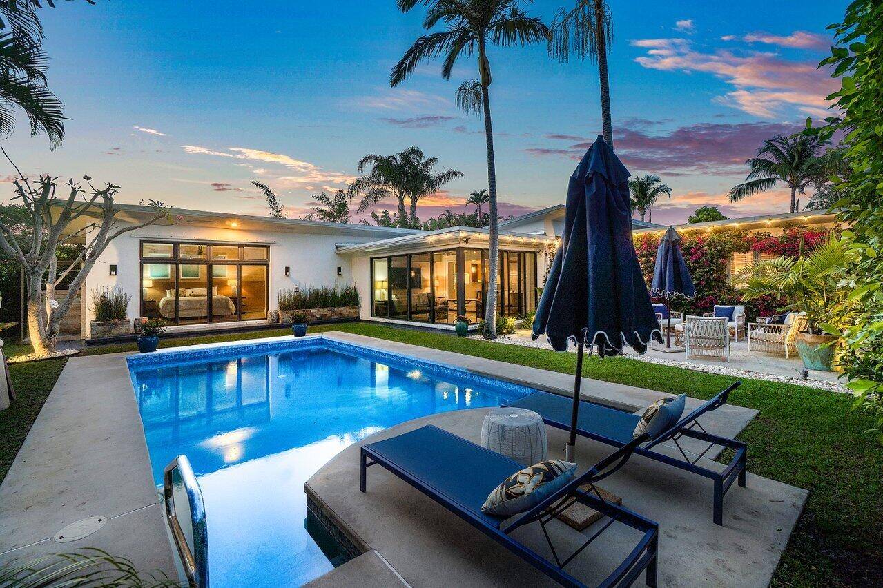 Step into tranquility with this exquisite mid century modern in the heart of Lake Worth Beach.