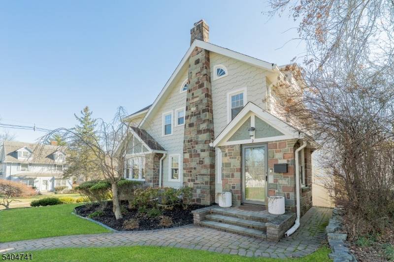 Beautifully updated rich in character, this classic Colonial seamlessly blends timeless period details w modern comfort and functionality.