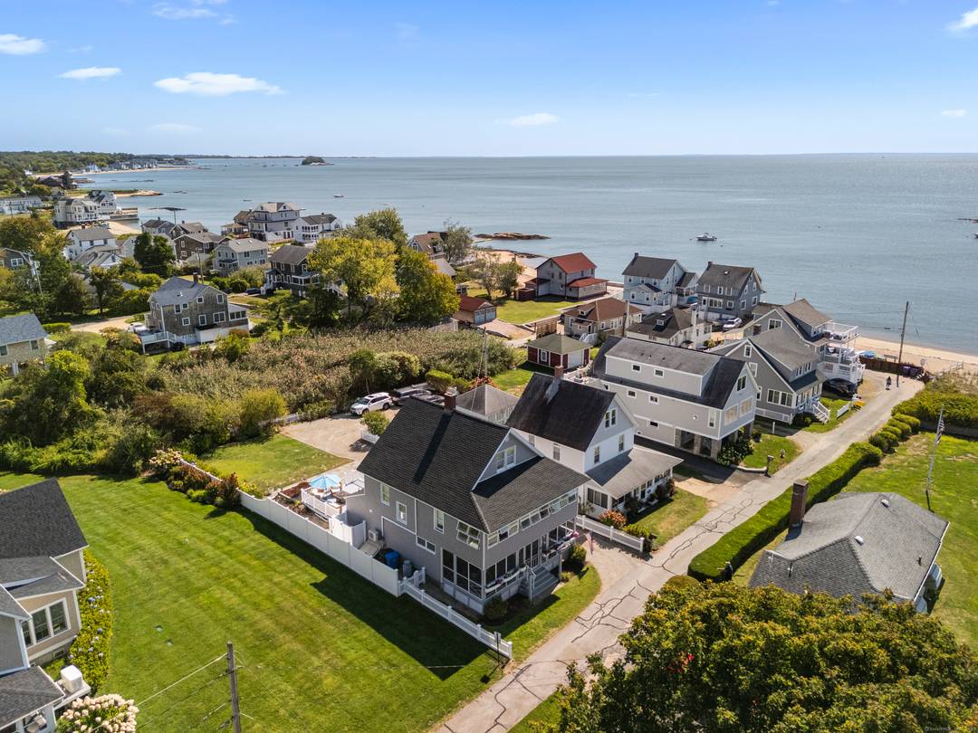 Live the shoreline lifestyle in this beautifully updated 4 6 bedroom, 3 bath Colonial, just 88 steps from your very own private beach.