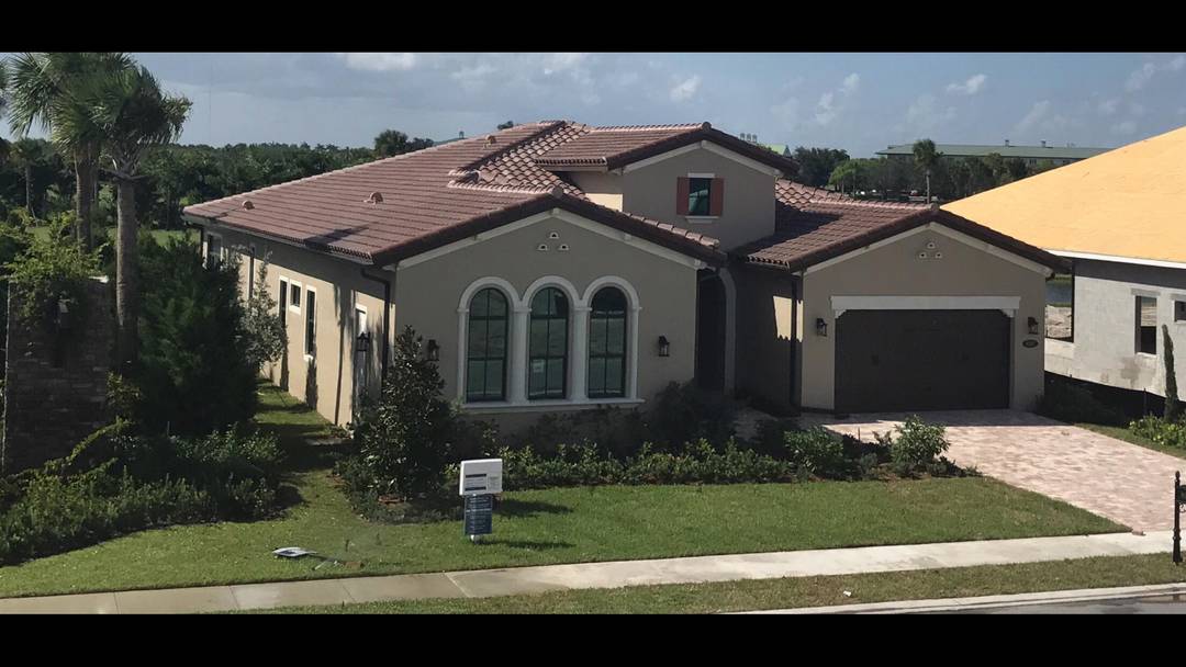Welcome to 9387 Grand Prix Lane, a beautifully appointed residence in the highly sought after Palm Meadows Estates of Boynton Beach.