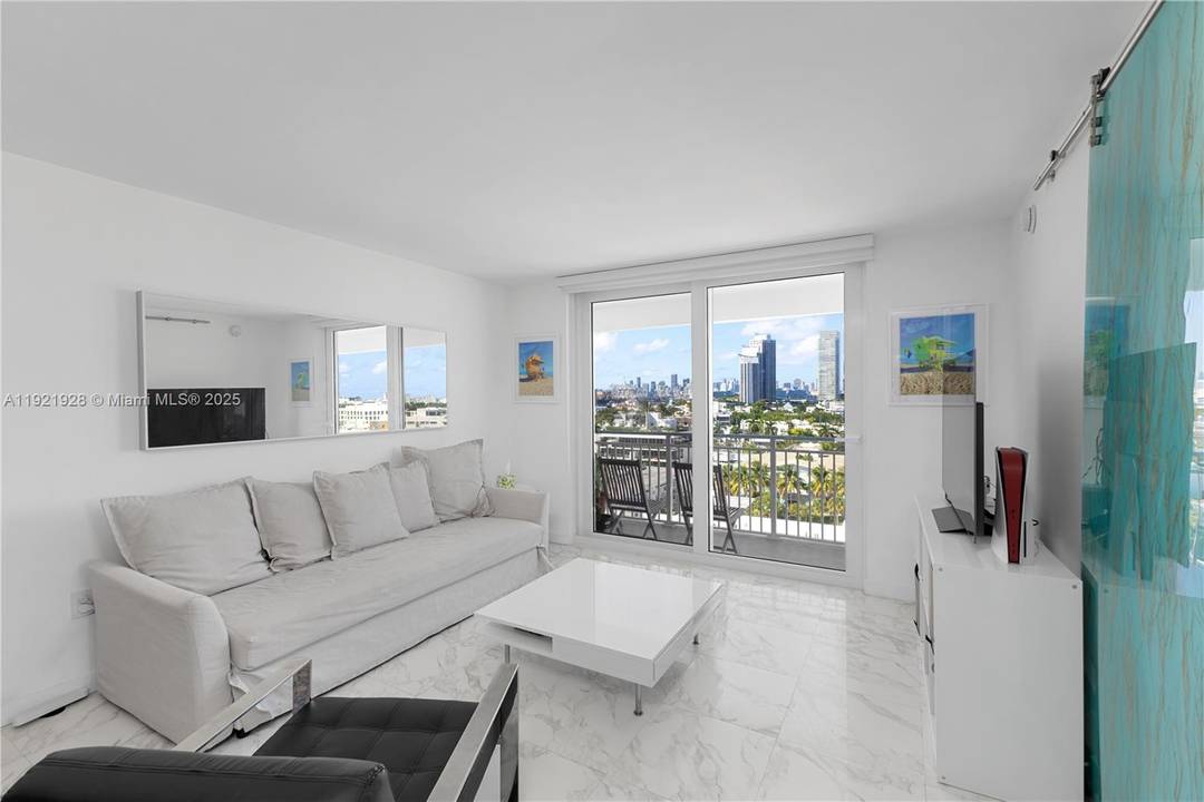 Completely updated amp ; beautifully fully furnished corner penthouse w incredible unobstructed sunset amp ; skyline views amp ; balcony in oceanfront South of 5th St condo.