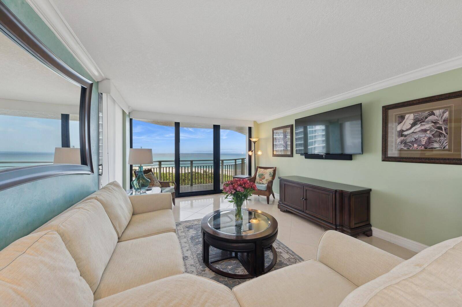 Enjoy coastal living in this 2 BR, 2 BA oceanfront condo on Singer Island.