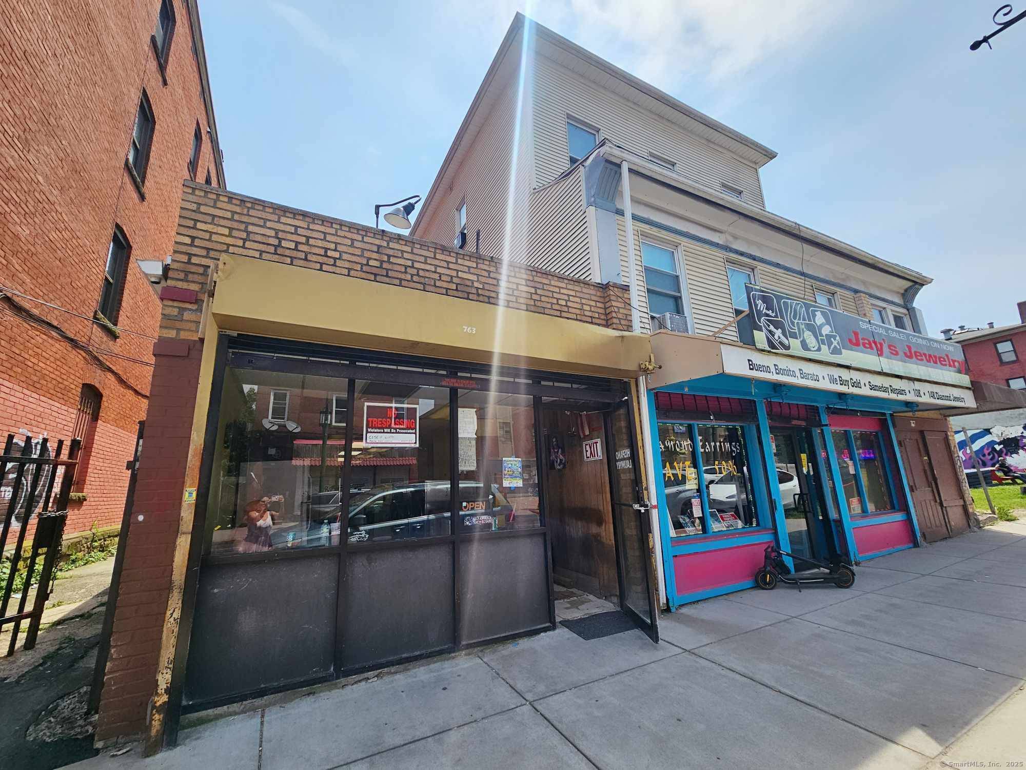 Unique opportunity featuring two buildings on one lot, endless possibilities in this wonderful mix use property with a total of 6 units 2 commercial and 4 residential.