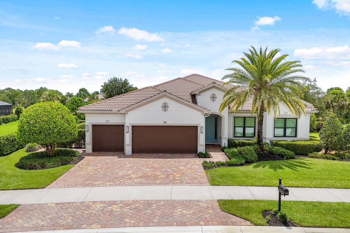 Elegance and thoughtful design come together in this exceptional residence located in the prestigious gated community of Copperleaf.