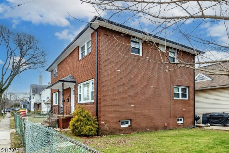 Beautifully Updated Side by Side Two Family Duplex Near Downtown Rahway.