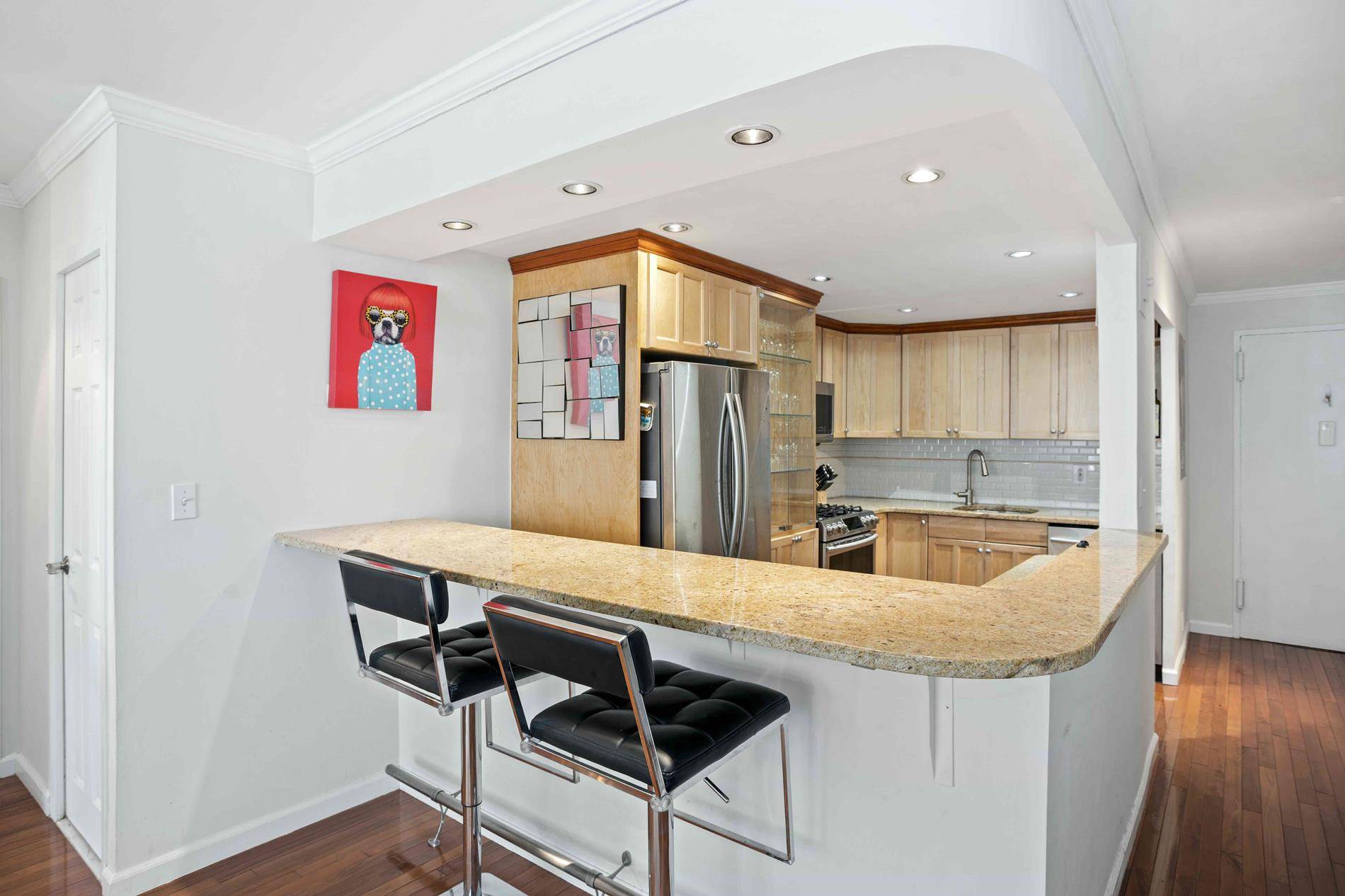MOVE IN READY ! This one of a kind, south facing extra large one bedroom offers an abundance of sunlight and views downtown including the Freedom Tower !