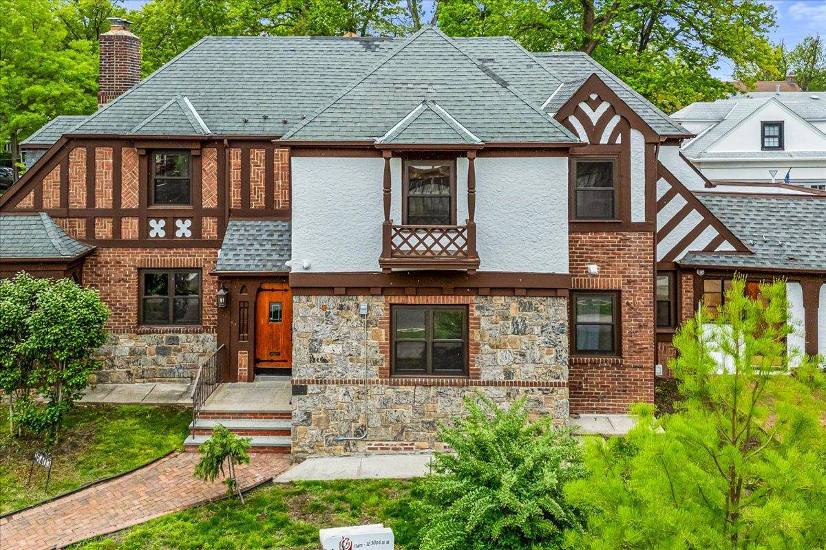 North Flushing Tudor style mansion plus an independent 300 plus square foot office or studio with a full bathroom.