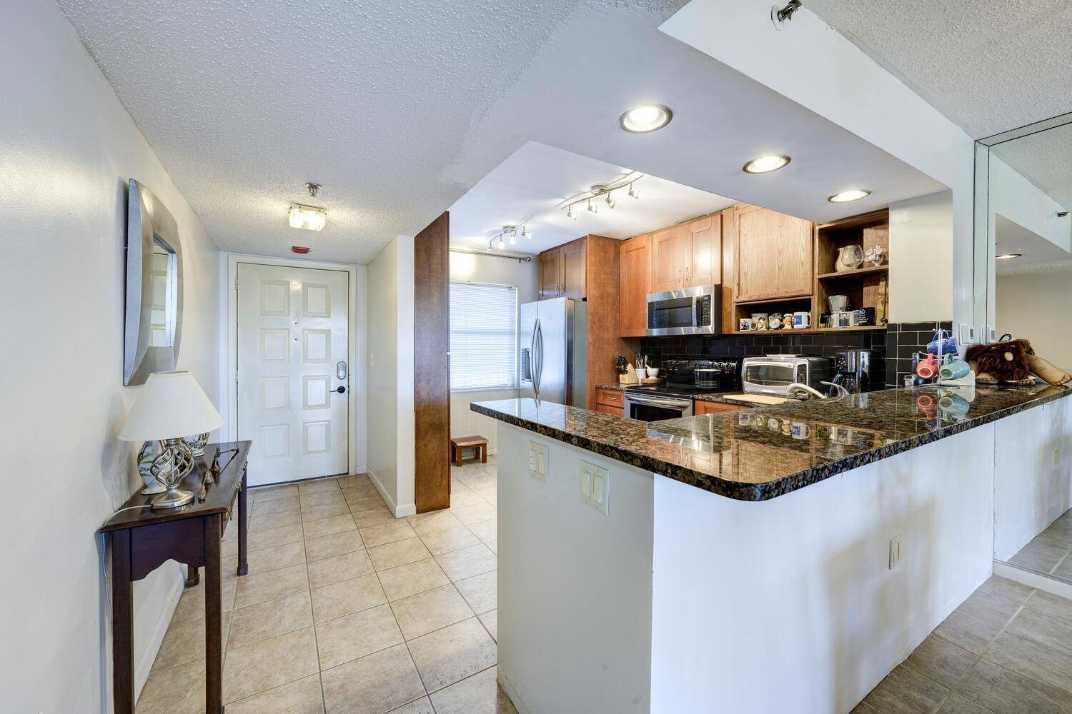 Discover this outstanding coastal condominium in the gated Intracoastal community of Hidden Harbour !