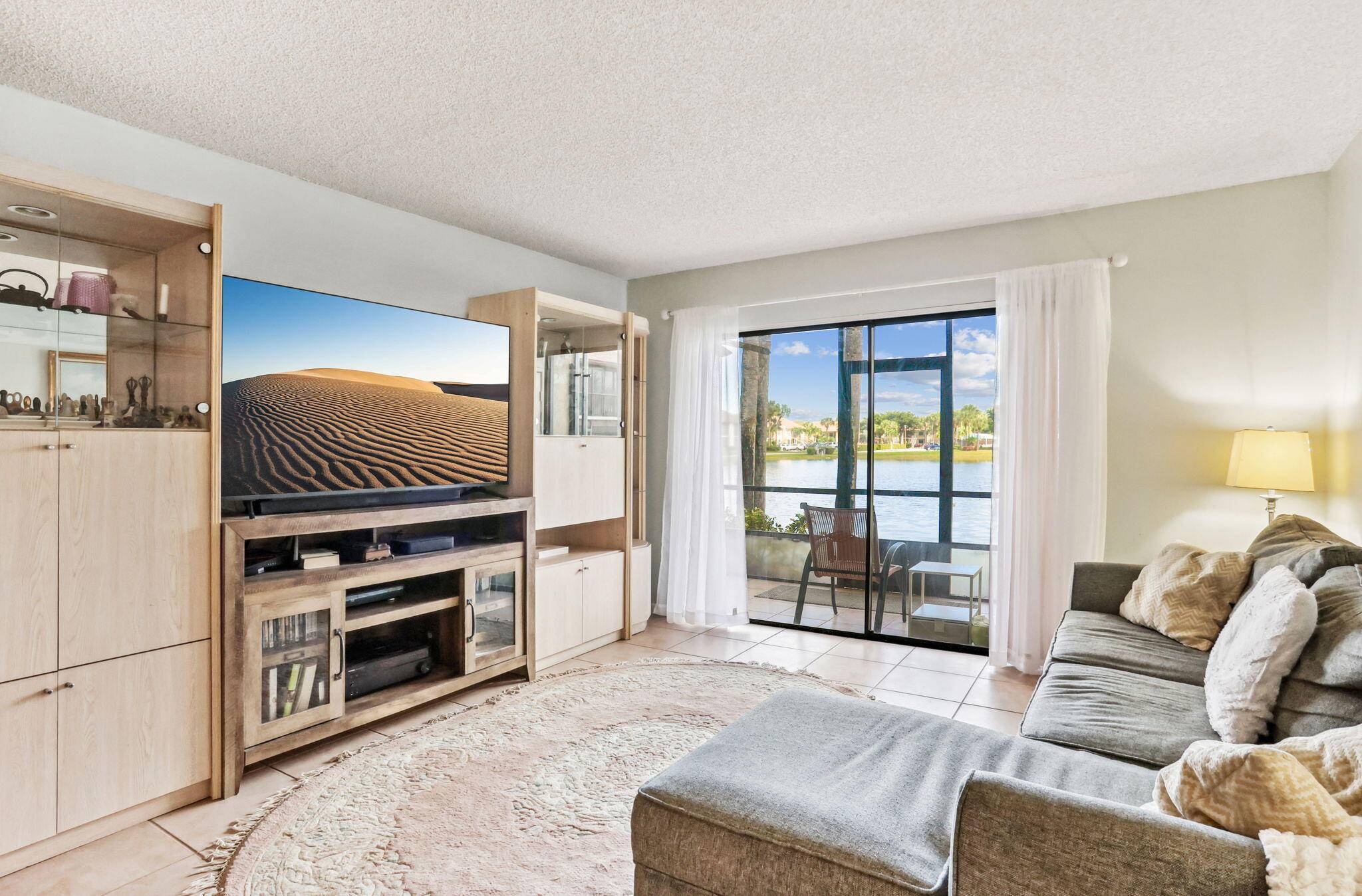 Beautifully Renovated 2 Bedroom 2 Bathroom Lakefront Unit w Serene Water Views !