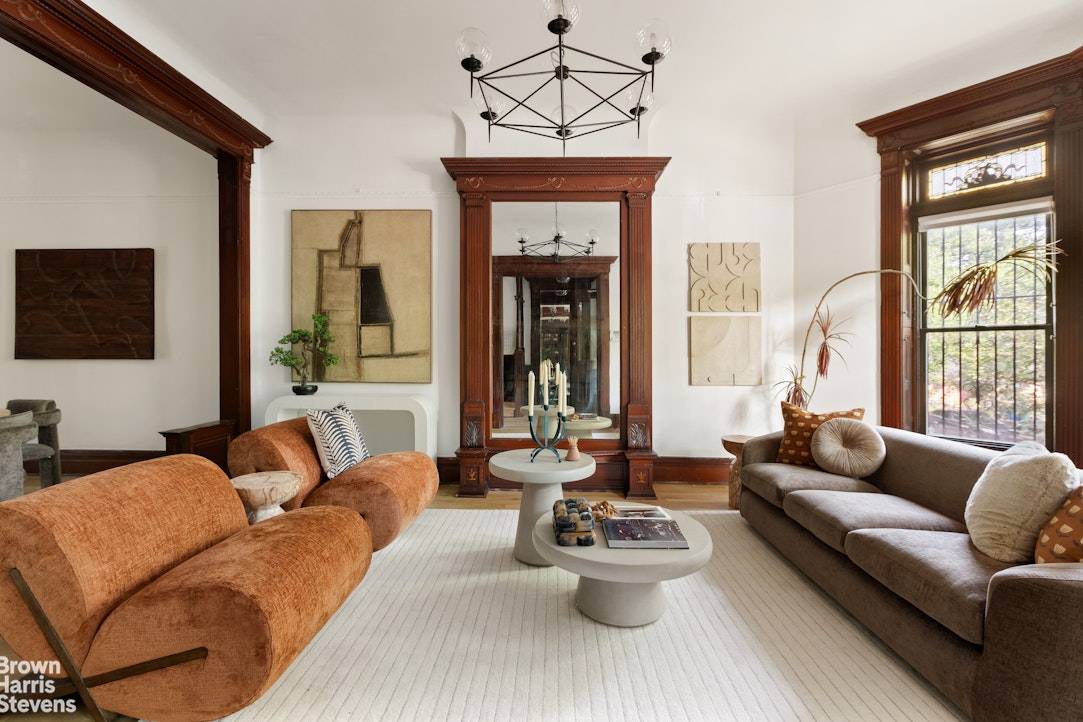 Welcome to 1456 Dean Street, a landmarked four bedroom townhouse where historic craftsmanship meets modern sophistication in the heart of Crown Heights.