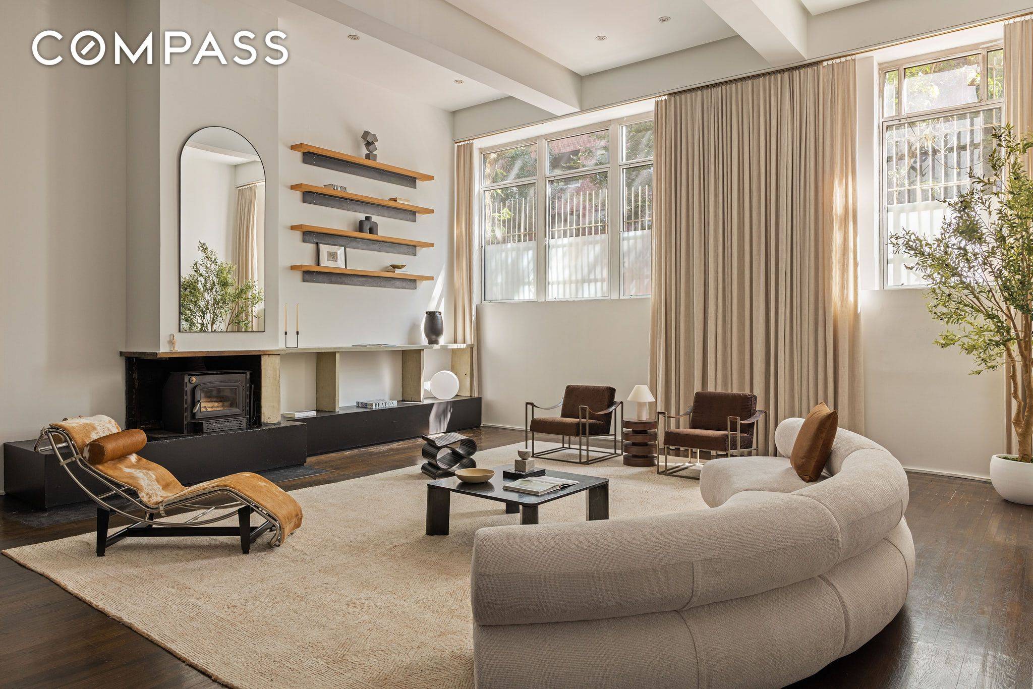 This sprawling West Village duplex co op masterfully fuses industrial scale with serene Japanese inspired design to both ground and elevate the classic New York City loft experience.