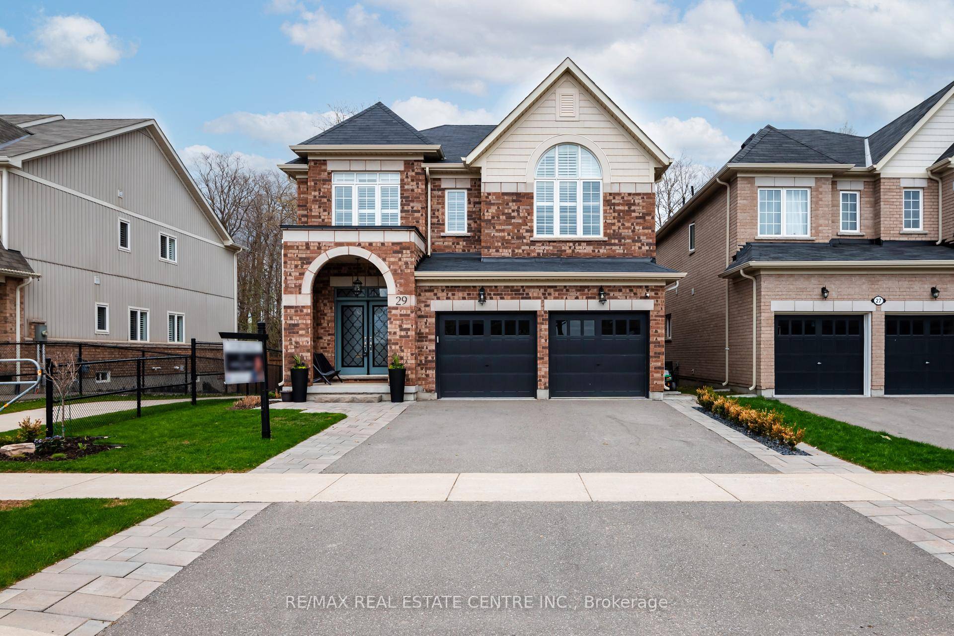 Exuding craftsmanship and genuine care, this bright and spacious four bedroom, five bath property in Grand Valley blends modern style with day to day comfort.
