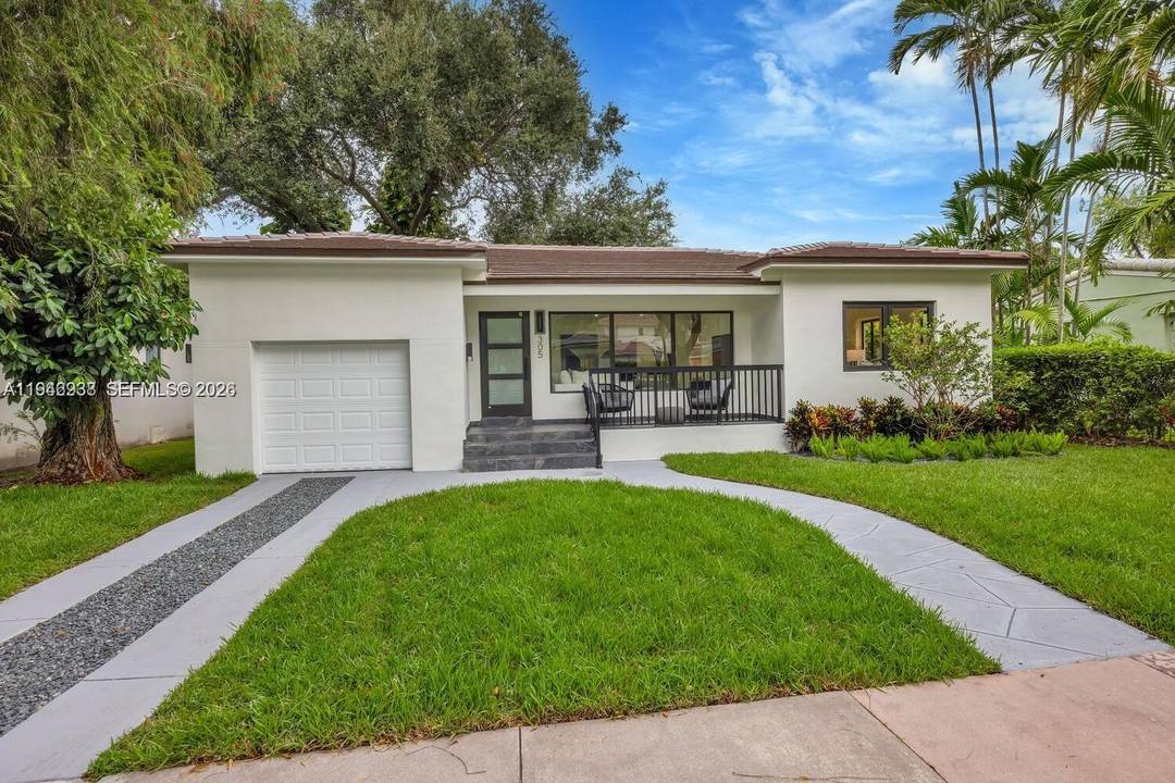 Discover unmatched luxury in this fully renovated 2 bedroom, 2 bathroom Coral Gables gem, set on a charming, tree lined street.