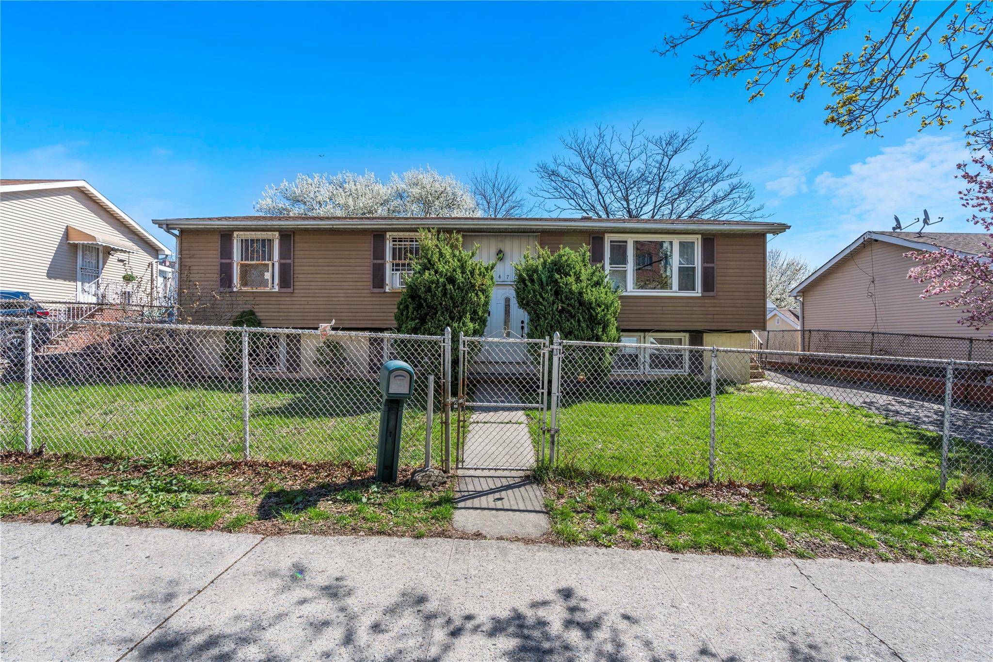 Welcome to 1470 Louis Nine Blvd, a solid home located in the vibrant Crotona Park section of the Bronx.