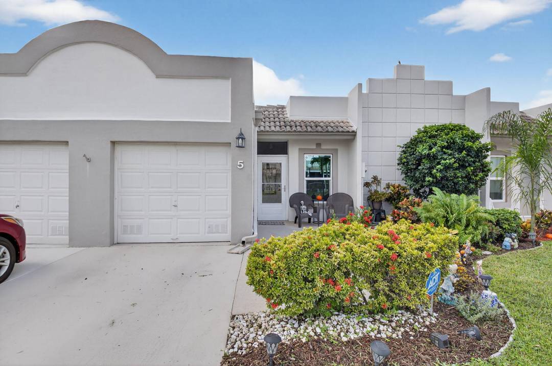 Discover your own tranquil retreat in this beautifully updated 2 bedroom, 2 bath villa with a magnificent lake view.