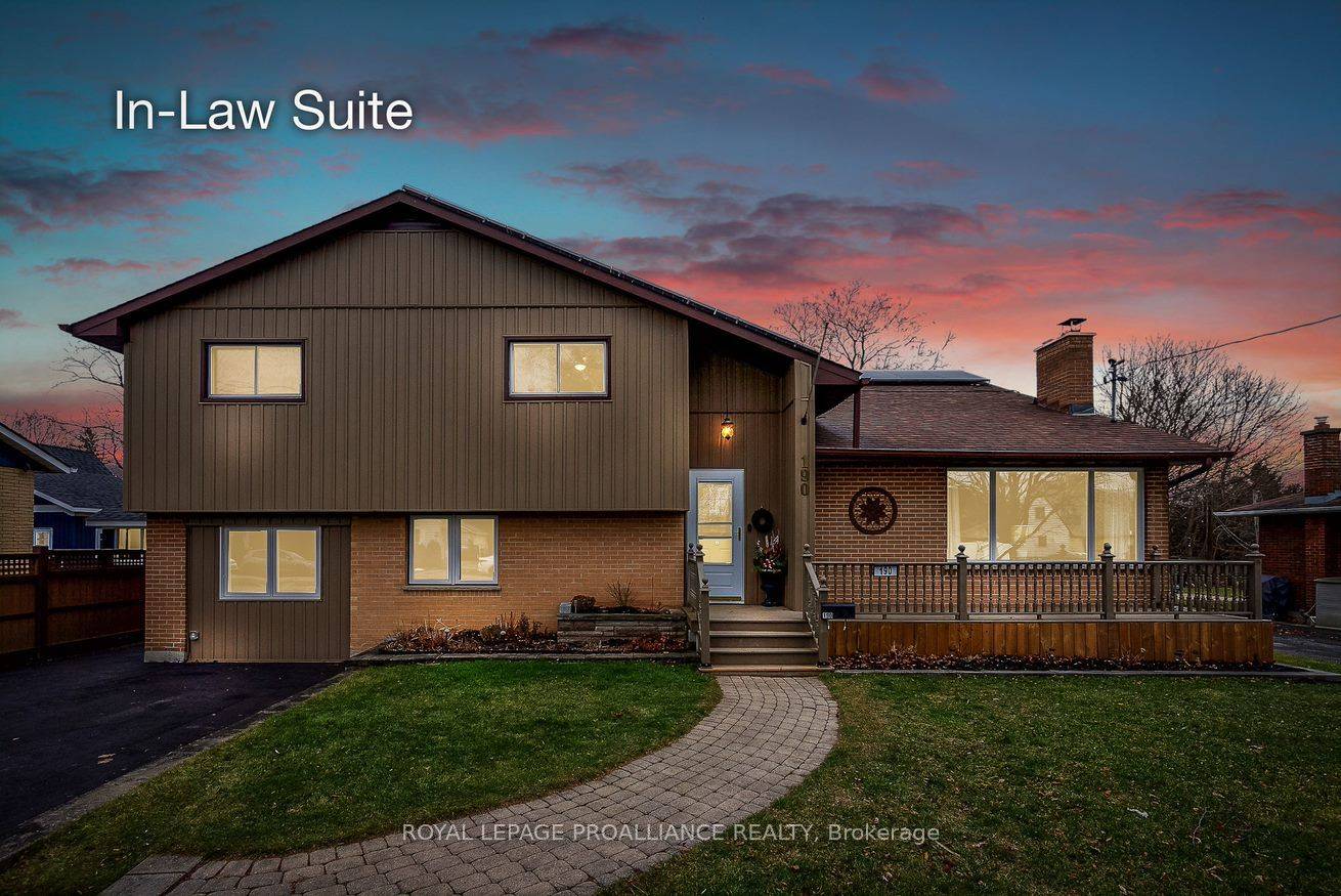 This impressive home, nestled on a spacious lot, welcomes you with a freshly paved driveway and a lovely front yard adorned with a mature birch tree and a neatly trimmed ...