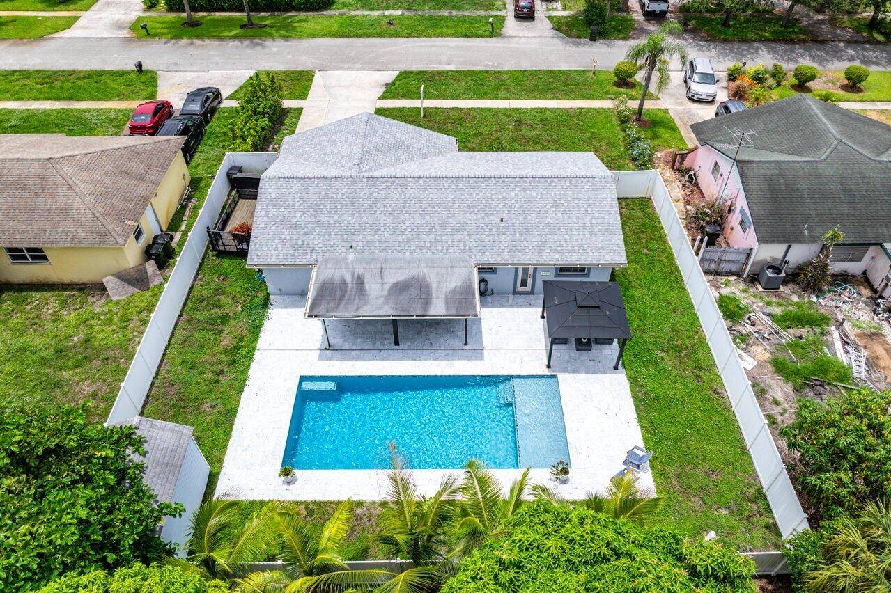 Meticulously re imagined, designer finished 2BR 2BA home just 5 minutes from vibrant Atlantic Ave's dining, shops, and beach.