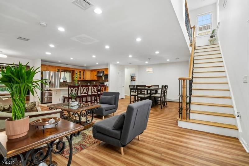 Custom 5 Bed, 3. 1 Bath Home offering the Convenience of Ranch Style Living with an important 2nd Floor Primary Suite Addition !