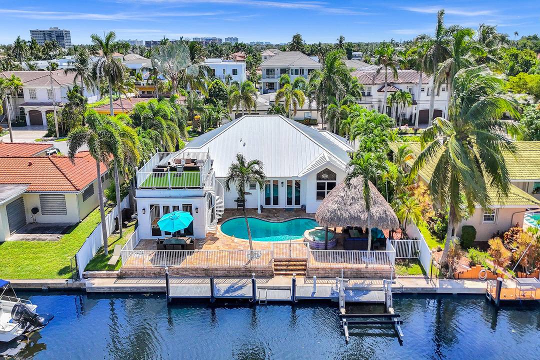 ABSOLUTELY GORGEOUS WATERFRONT ESTATE PRESTIGIOUS EAST BOCA RATON LOCATION BRATHTAKING WATER VIEWSFROM ROOFTOP TERRACE DIRECT OCEAN ACCESS NO FIXTED BRIDGES PRIVATE DOCK amp ; BOAT LIFT 10, 000 lbs TROPICAL ...