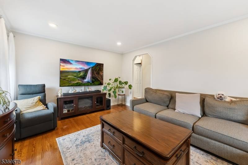 Welcome to this BEAUTIFULLY maintained Charming Cape Cod with a SPACIOUS eat in kitchen that has a door to walk out into a LARGE, leveled and well manicured BACKYARD with ...