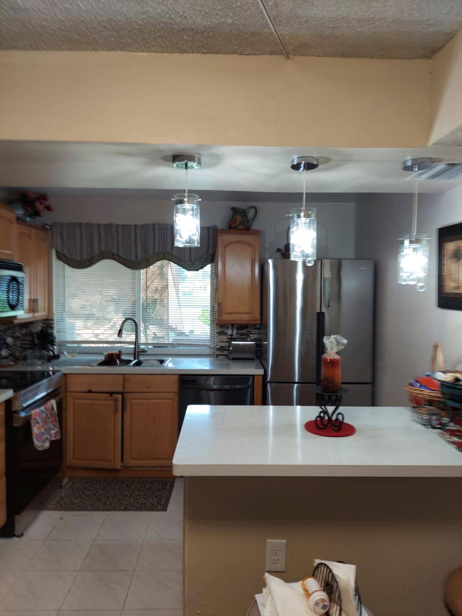 UPDATED UNIT ON THE FIRST FLOOR OVERLOOKING THE LAKE.