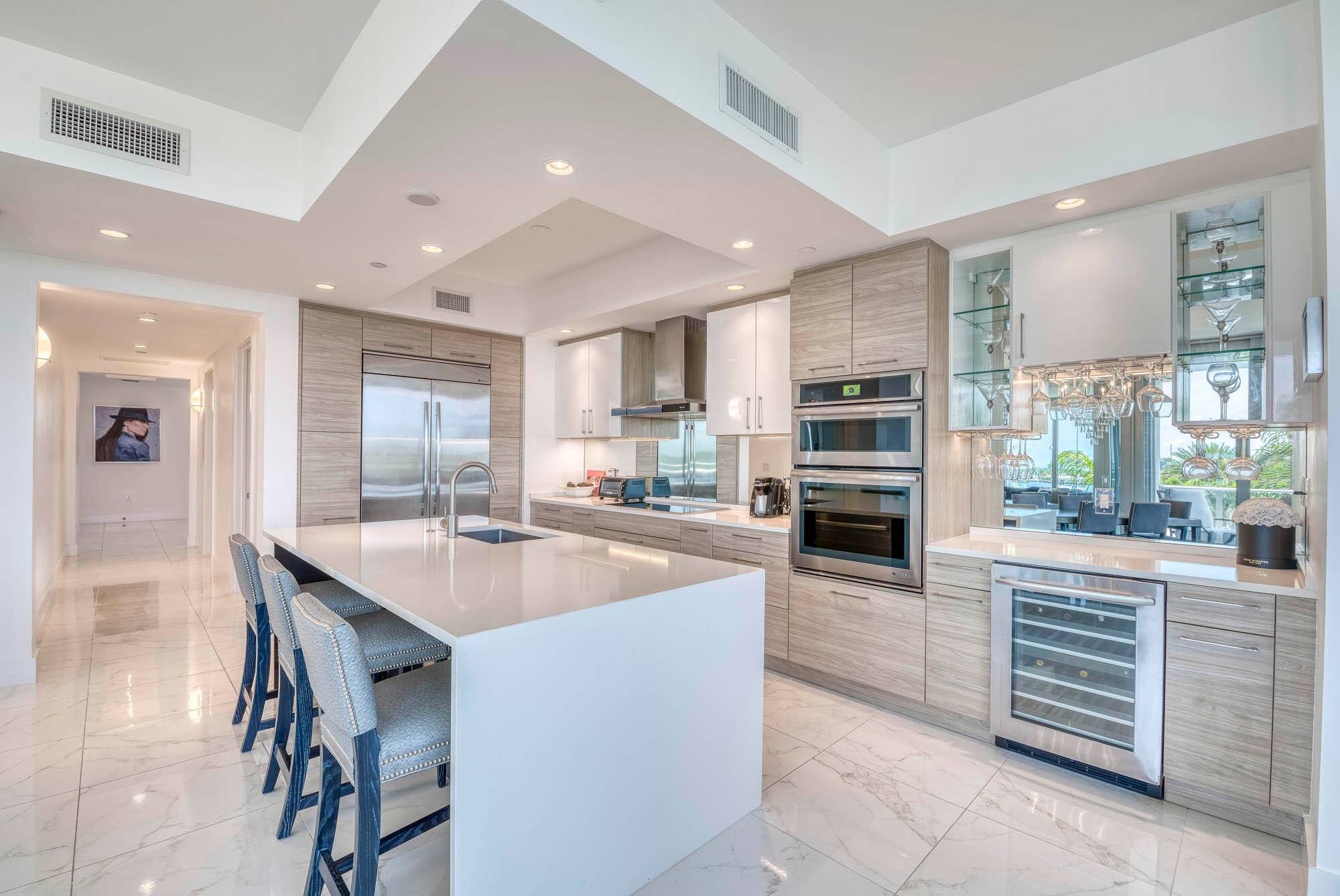 This Elegant Cobalt model located in the exclusive South tower of Water Club boasts breathtaking Intracoastal views, ultra high end interior finishes, resort style amenities, and private elevator access.