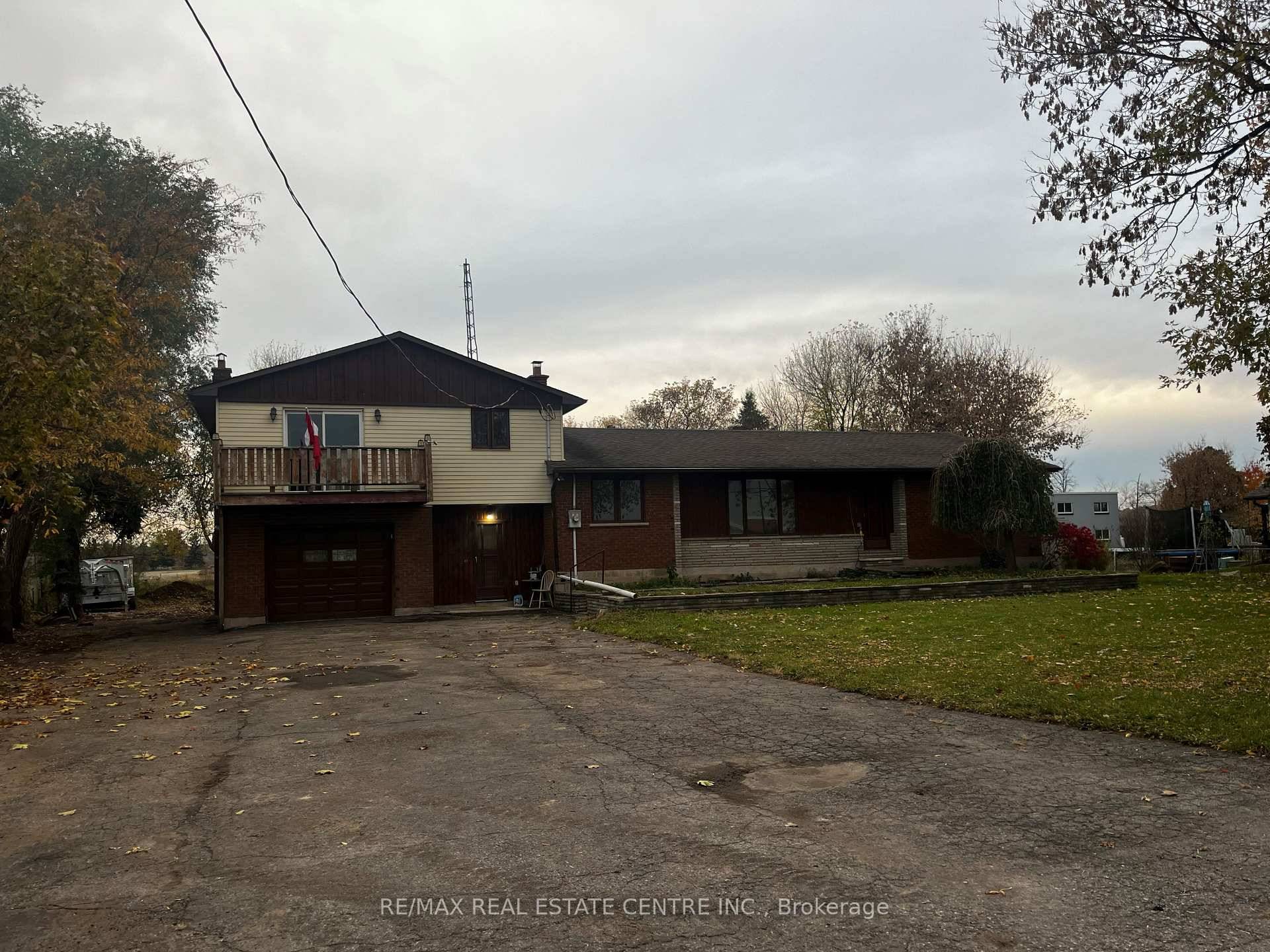 RARE OPPORTUNITY WITH JUST OVER ONE ACRE OF LAND.