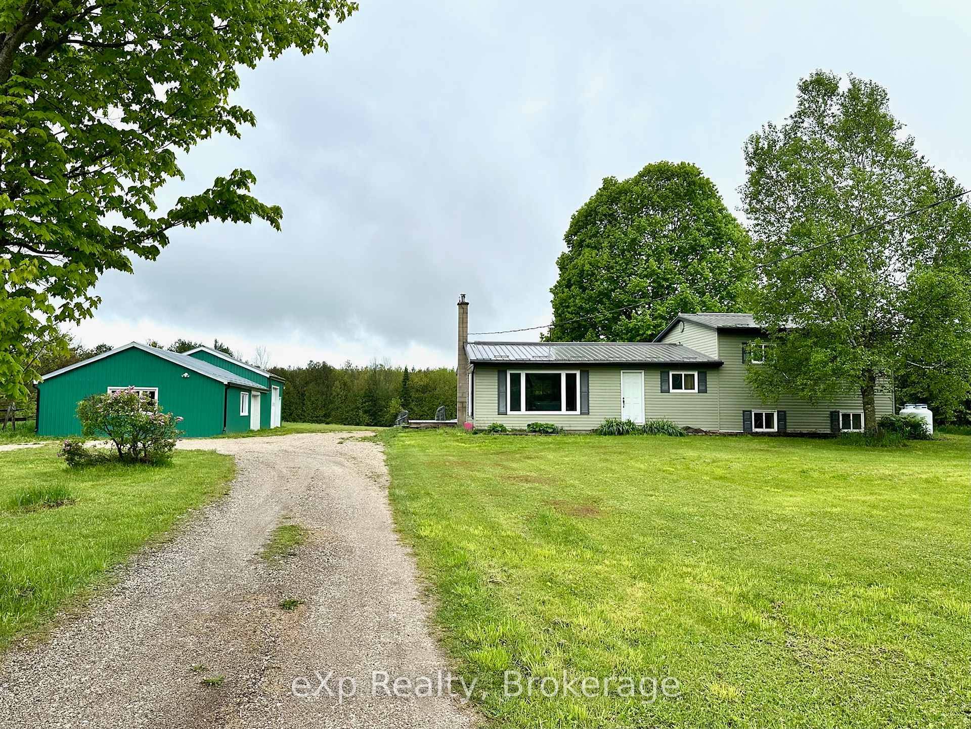 House and shop on almost three acres, in a private setting, backing the Styx River ; what more could you ask for ?