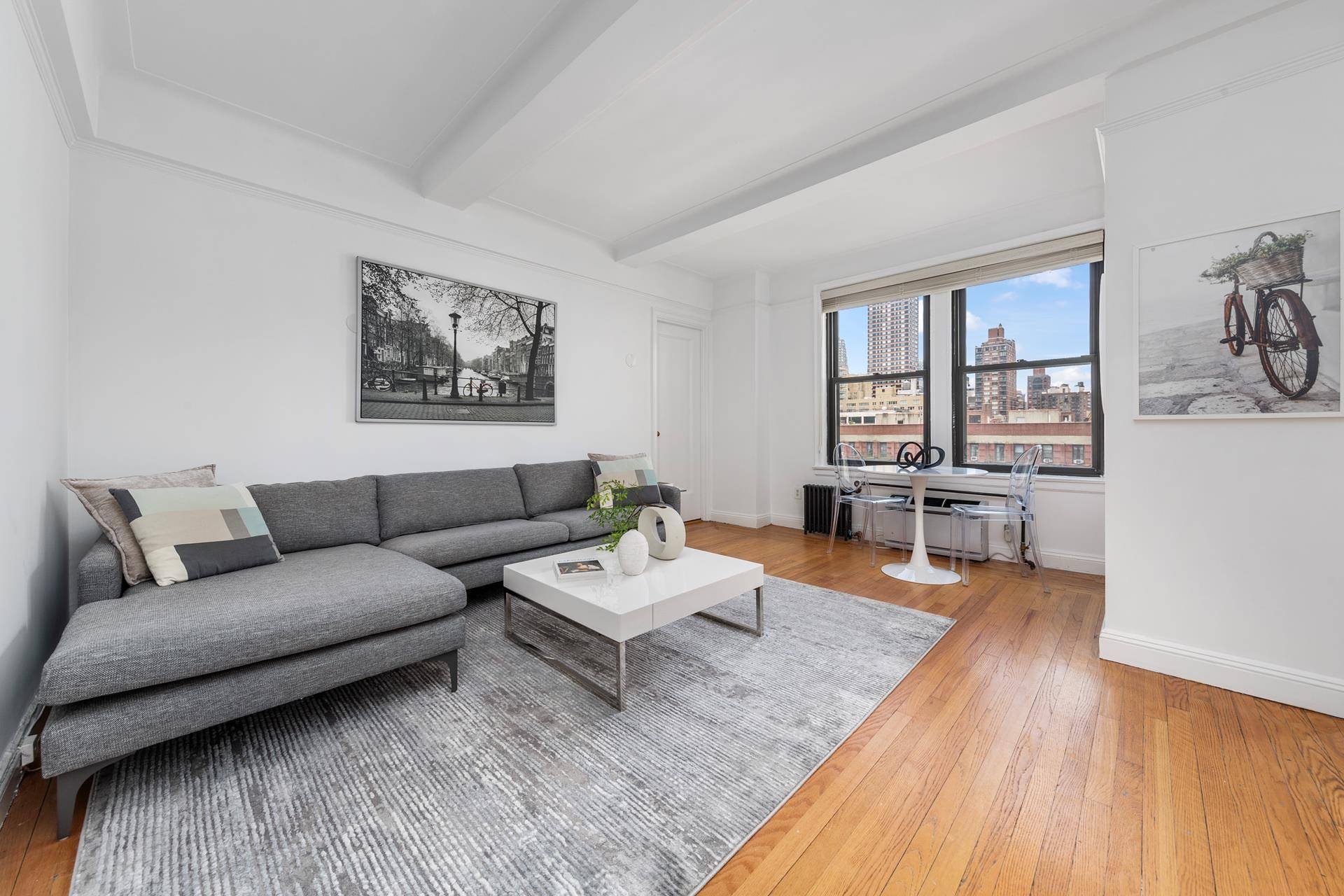 Just Listed, a sun blasted and charming pre war south facing 1 bedroom home with a low maintenance in a one of the premier UES full service white glove coop's.