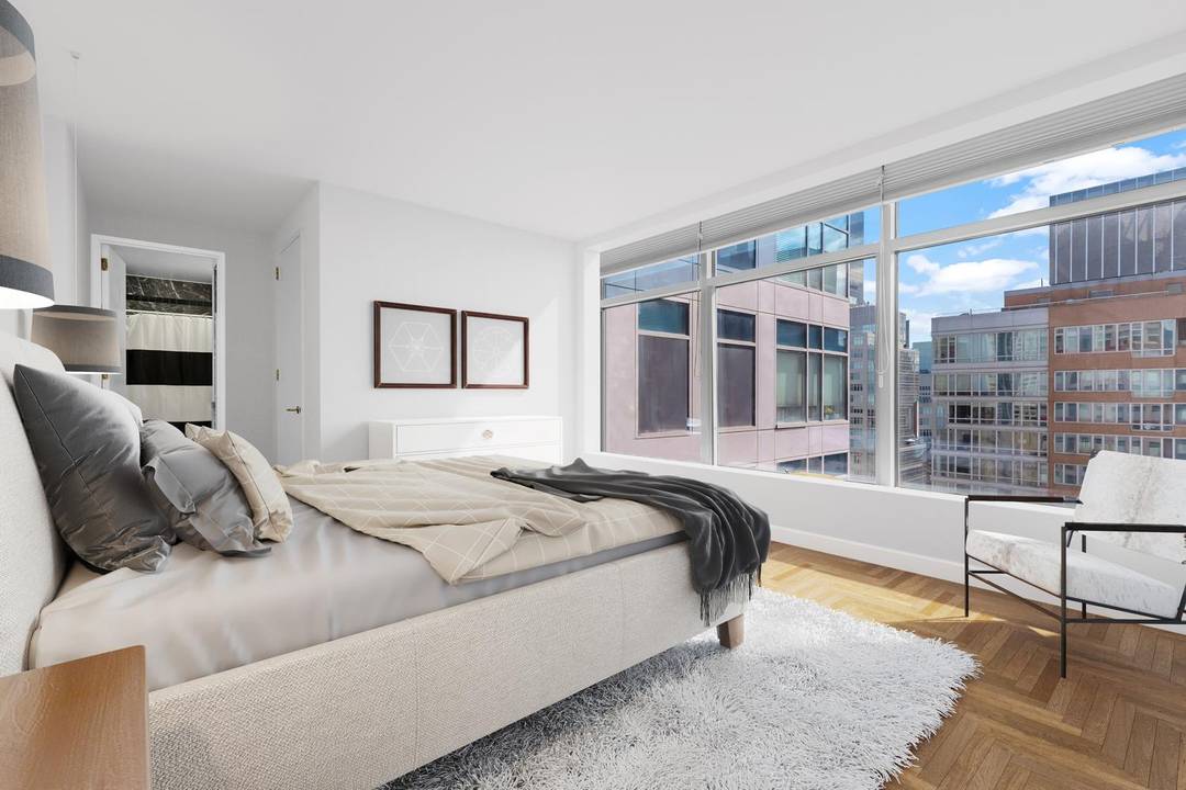 Perched on the 31st Floor, this Radiant Glass Enclosed Corner Residence Captures Stunning South, North, and West Exposures with Panoramic City and River Views !