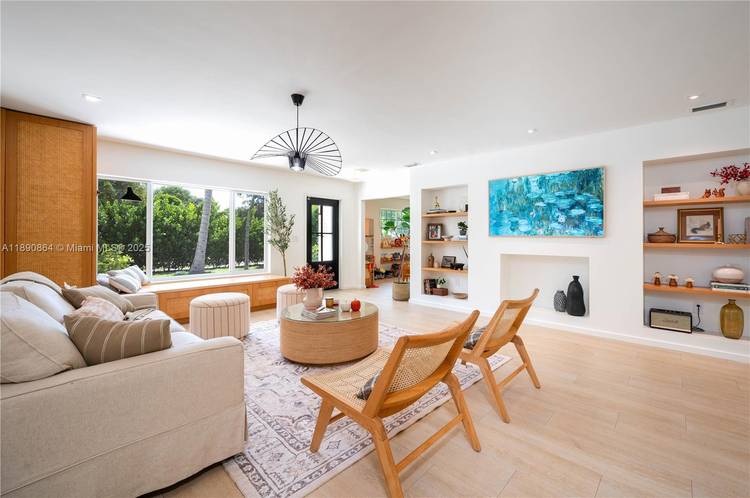 Nestled across from Coral Gables and close to top schools, UM, and scenic parks, this renovated 3 Bed convertible den office, 3 Bath residence blends charm, comfort, and modern updates.