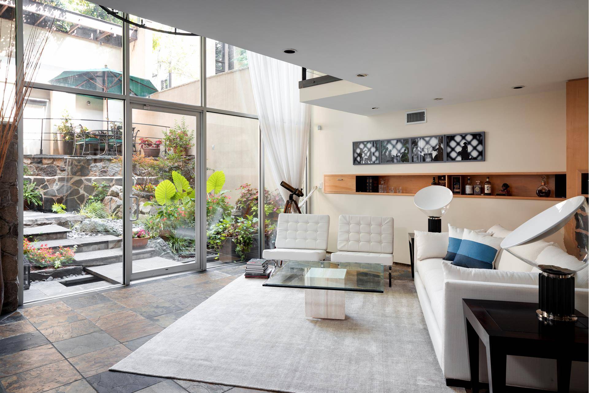Situated on a picturesque Brooklyn Heights block, 47 Columbia Place wraps a secret world in a modern facade.