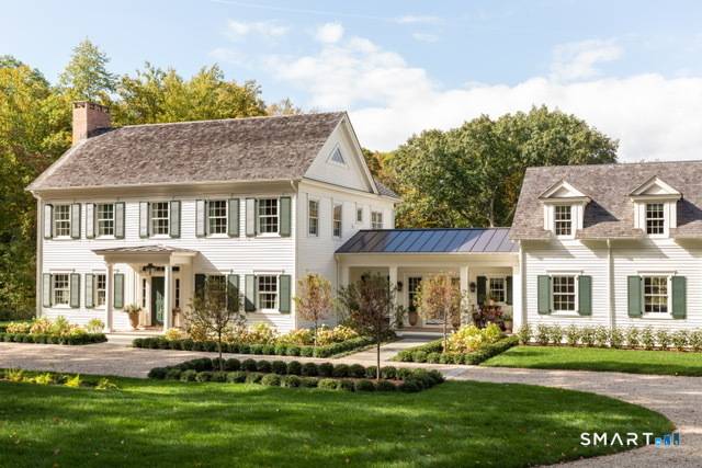 Imagined and designed by award winning interior designer, Jennifer Beek Hunter, this newly constructed, custom, classic Greek Revival is perfectly located in top Washington location.