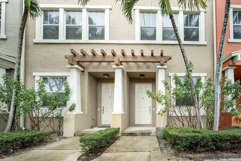 Discover this stunning 3 story townhome in the vibrant heart of West Palm Beach !