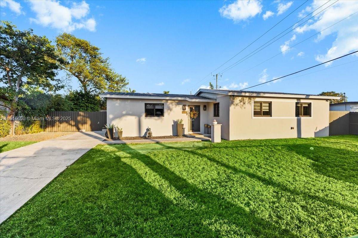 Beautiful home featuring impact windows throughout all bedrooms and kitchen, plus an impact front door for added safety and peace of mind.