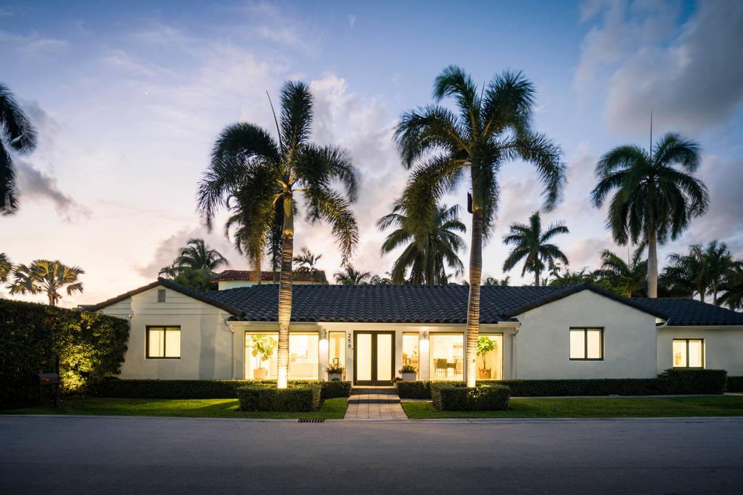 Situated on prestigious Palm Island, this serene Miami Beach residence blends modern design with relaxed coastal living.
