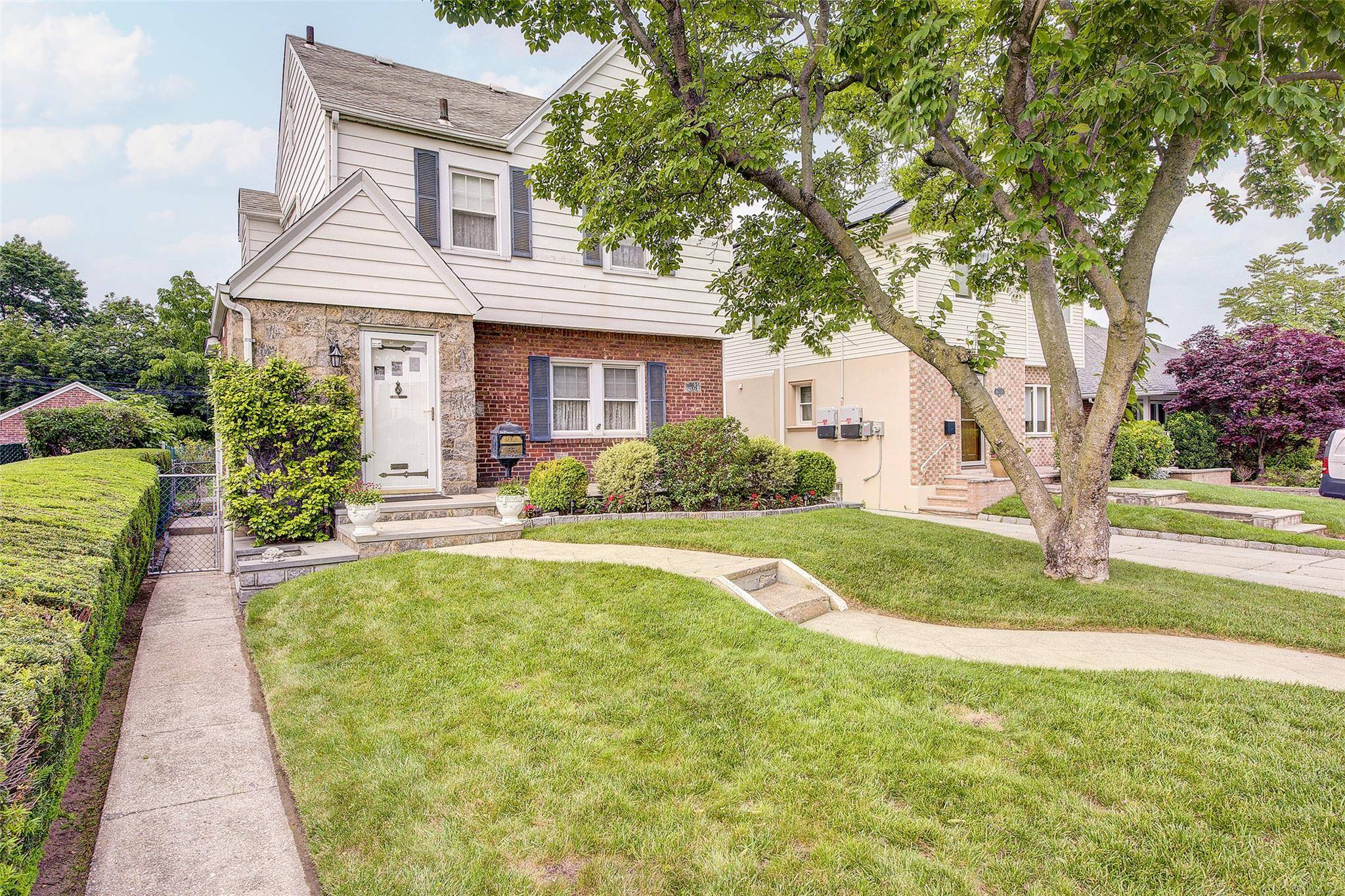 This beautifully maintained home is currently used as a one family residence, but comes with a legal two family C of O, offering flexibility for future use or investment potential.