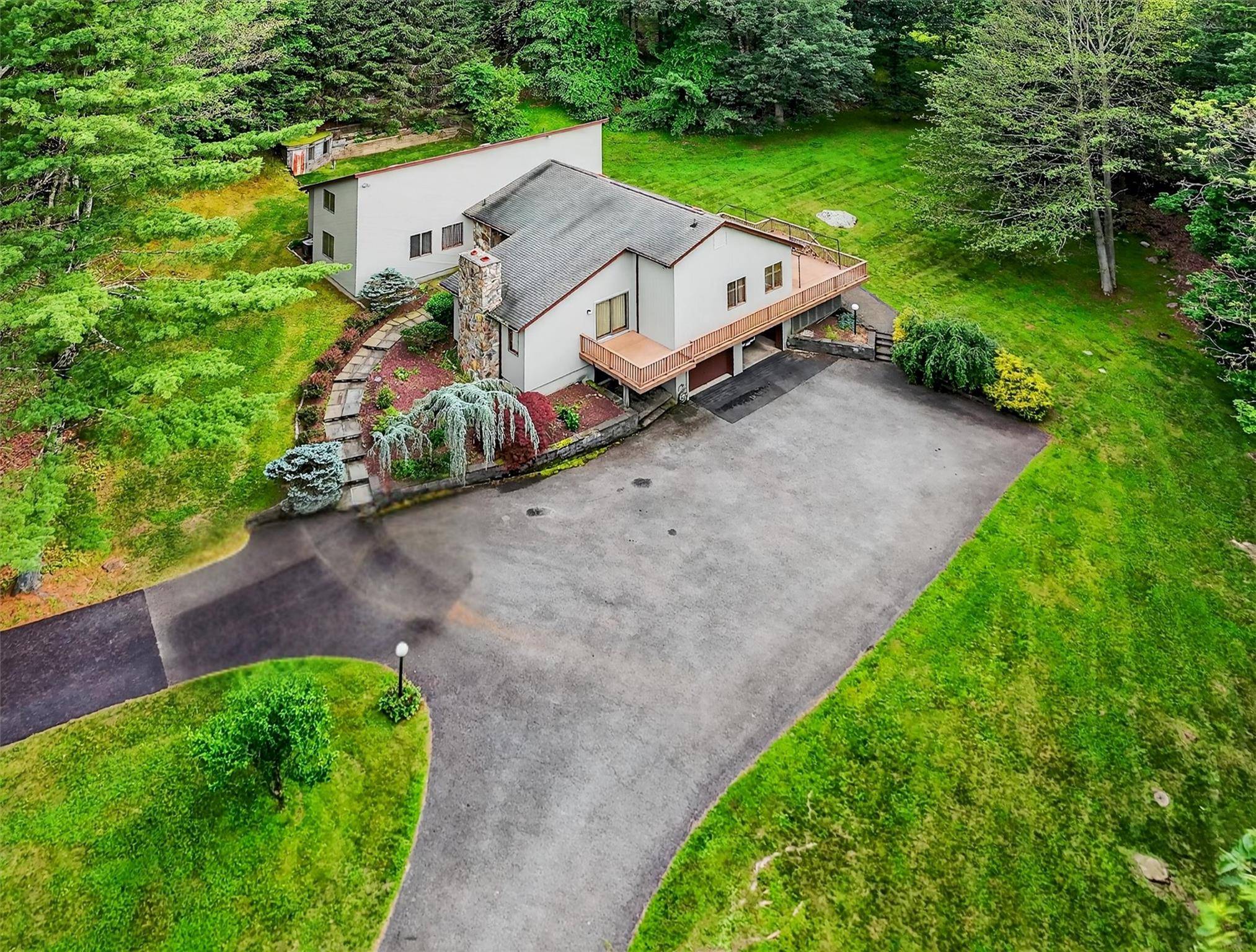 Welcome to 35 Greenlawn Rd in beautiful Amawalk, NY where luxury living meets everyday comfort.