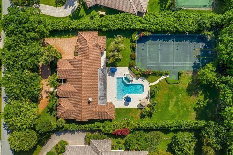 Luxury estate in prestigious Long Lake Estates on a private 1 acre lot with 24 hour manned amp ; patrolling security.