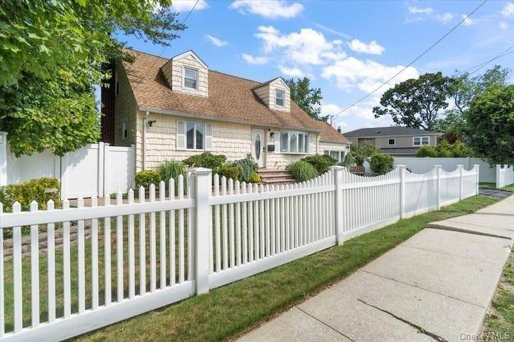 Excellent one of a kind Cape Cod in the Award winning Bethpage School District.
