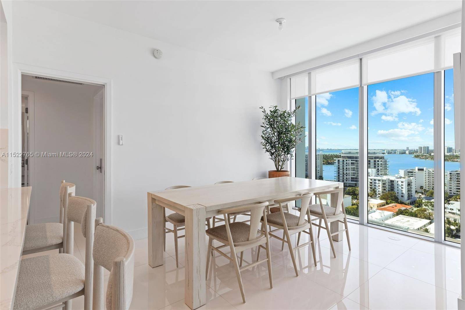 This renovated high floor condo offers breathtaking views of the sunset and inter coastal at the Carillon Miami Beach in Florida.