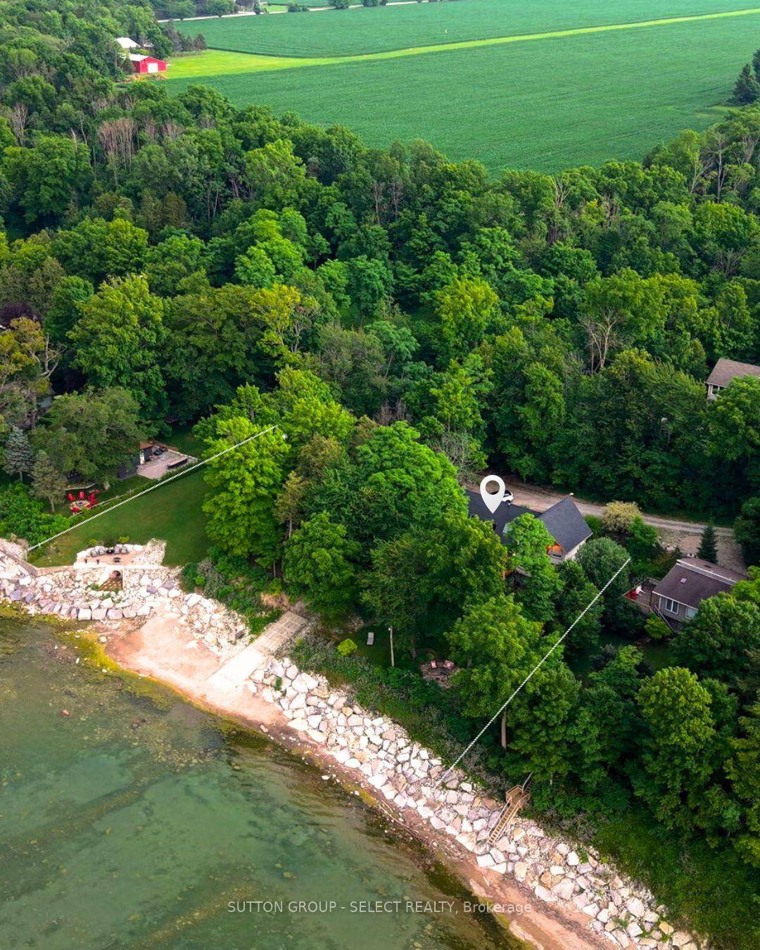 A RARE OPPORTUNITY TO OWN ONE OF THE MOST PRIVATELY OWNED BEACHFRONT PROPERTIES IN LAMBTON SHORES WITH 222 FT OF BEACHFRONT and a 1 acre estate sized lot on a ...
