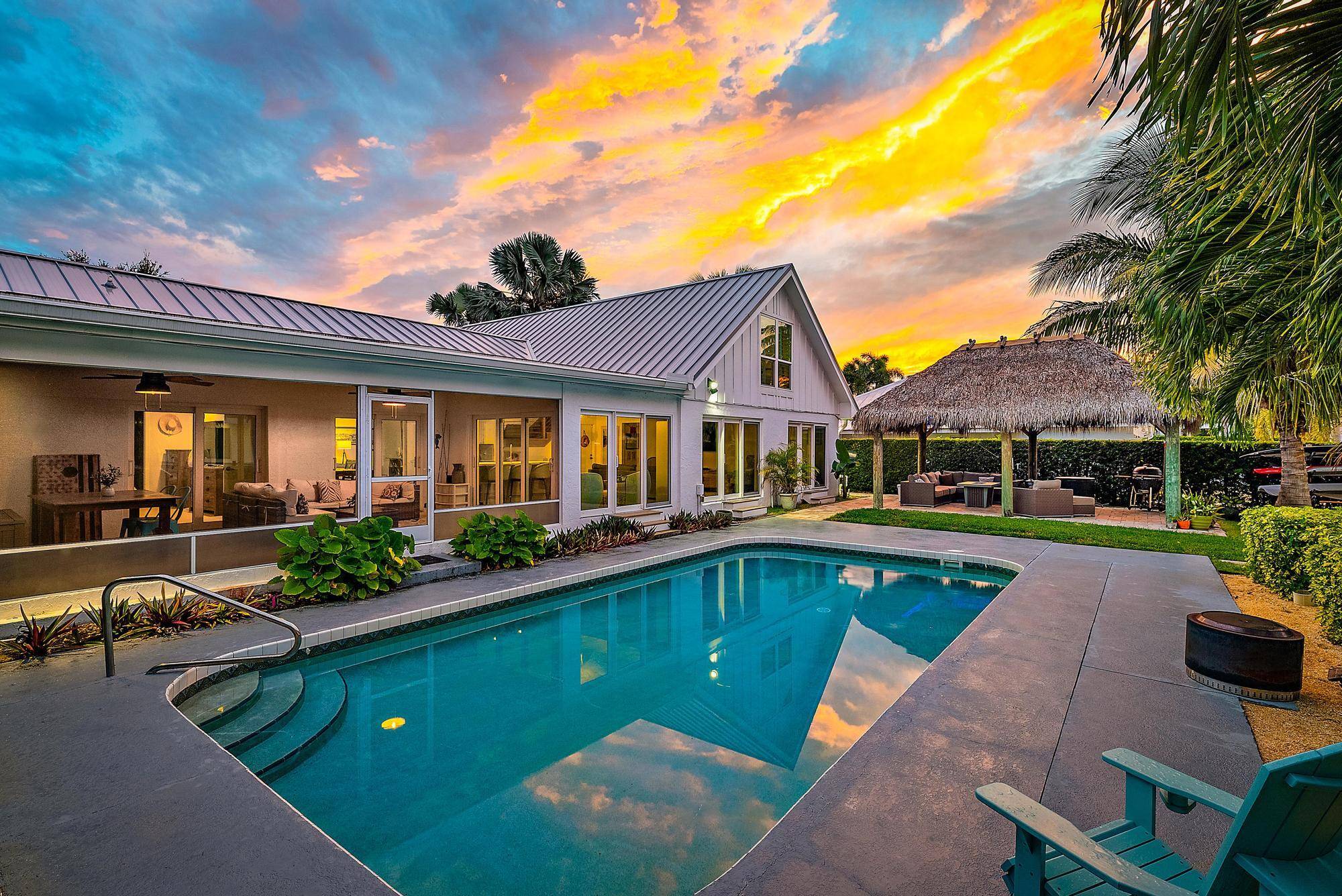 OPPORTUNITY awaits in the highly sought after enclave of COUNTRY CLUB POINT in the beautiful and serene Village of Tequesta.