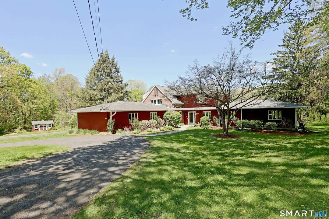 Truly remarkable one of a kind home plus attached in law apartment with separate entrance.
