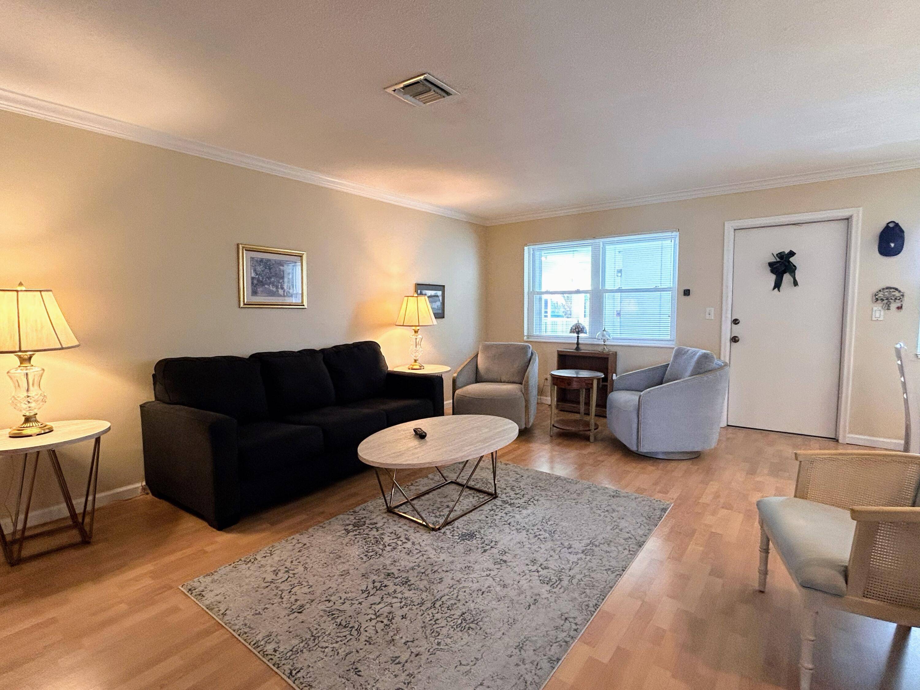 RARE 2 BEDROOM 1 BATH CONDO ON 3RD FLOOR W ELEVATOR, OCEAN BREEZES AND VIEWS OF VILLAGE'S PROMENADE AND INTRACOASTAL.