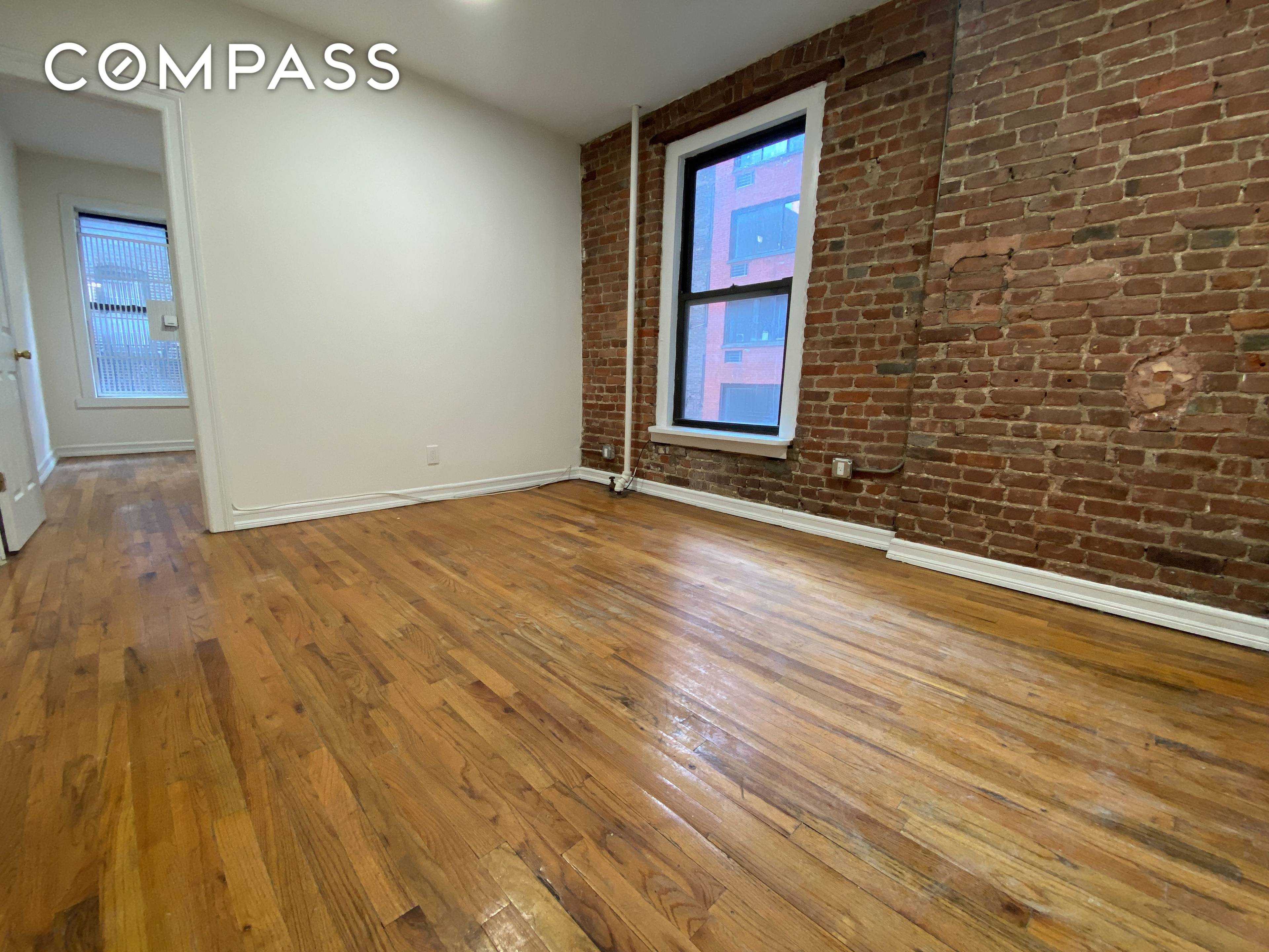 Upper East Side True 2BD 1BA with Windowed Kitchen, Exposed Brick, Hardwood Floors, Separate Living Room and Laundry in Building This economical two bedroom home features sprawling hardwood floors, a ...
